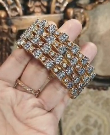 Gold palted jarao bangles